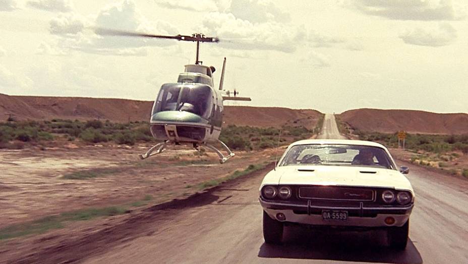 Corrida Contra o Destino (1971) - Pode o mito de um carro nascer no cinema? Sim, é o caso do Dodge Challenger, produzido só de 1970 a 1974, ocaso dos pony-cars, mas sempre lembrado pelo filme. <a href="%20https://gutenberg.quatrorodas.abril.com.br/blogs/planeta-carro/" rel="migration"></a> Corrida Contra o Destino (1971) - Pode o mito de um carro nascer no cinema? Sim, é o caso do Dodge Challenger, produzido só de 1970 a 1974, ocaso dos pony-cars, mas sempre lembrado pelo filme. <a href="%20https://gutenberg.quatrorodas.abril.com.br/blogs/planeta-carro/" rel="migration"></a>