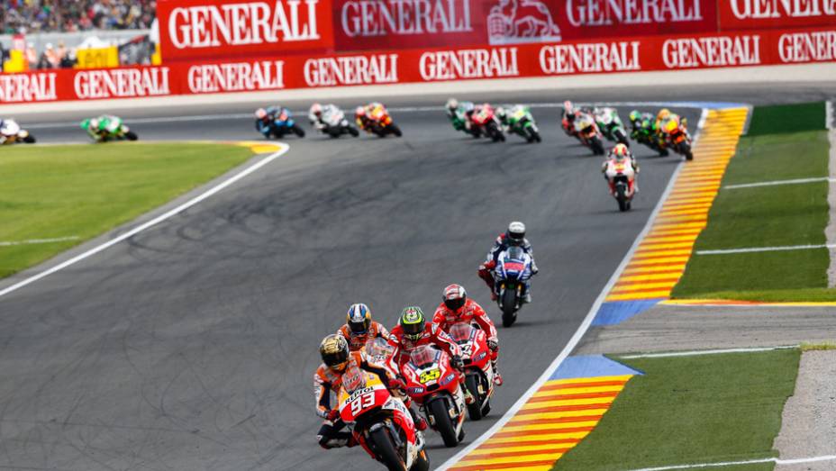 Valência foi o palco da última etapa da temporada 2014 da MotoGP. | <a href="https://gutenberg.quatrorodas.abril.com.br/moto/noticias/motogp-marquez-vence-quebra-recorde-vitoria-temporada-811357.shtml" rel="migration">Leia mais</a>