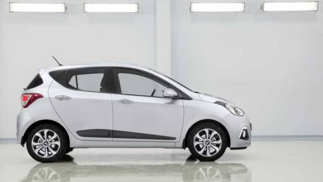 Olhando de lado, o desenho das janelas lembra o ix35 | <a href="https://gutenberg.quatrorodas.abril.com.br/saloes/frankfurt/2013/hyundai-i10-753181.shtml" rel="migration">Leia mais</a> Olhando de lado, o desenho das janelas lembra o ix35 | <a href="https://gutenberg.quatrorodas.abril.com.br/saloes/frankfurt/2013/hyundai-i10-753181.shtml" rel="migration">Leia mais</a>