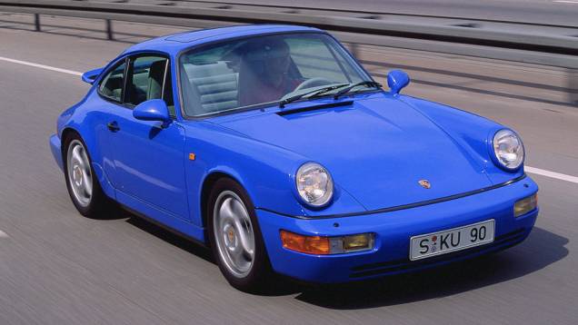 911 Carrera 2.4 3.6 1988 (964) - Ao reconhecer apenas os novos para-choques envolventes, é difícil prever que 85% das peças eram novas também na nova geração | <a href="%20https://gutenberg.quatrorodas.abril.com.br/reportagens/classicos/porsche-911-50-anos-748361.shtm" rel="migration"></a> 911 Carrera 2.4 3.6 1988 (964) - Ao reconhecer apenas os novos para-choques envolventes, é difícil prever que 85% das peças eram novas também na nova geração | <a href="%20https://gutenberg.quatrorodas.abril.com.br/reportagens/classicos/porsche-911-50-anos-748361.shtm" rel="migration"></a>