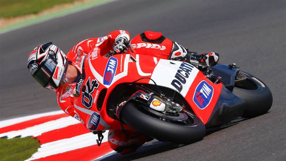 Andrea Dovizioso levou a Ducati ao sétimo lugar nos treinos classificatórios | <a href="https://gutenberg.quatrorodas.abril.com.br/moto/noticias/motogp-marquez-garante-pole-silverstone-751994.shtml" rel="migration">Leia mais</a>