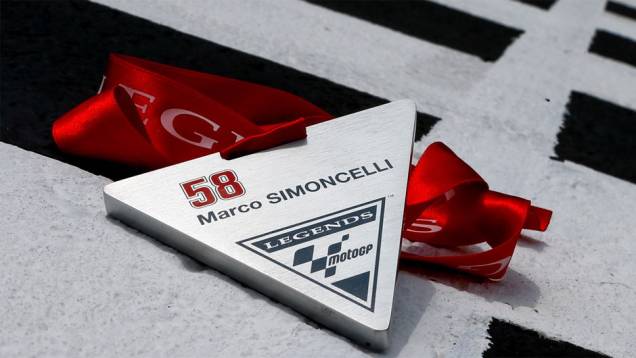 Marco Simoncelli entrou para o seleto grupo de Lendas da MotoGP | <a href="https://gutenberg.quatrorodas.abril.com.br/moto/noticias/motogp-marquez-lidera-treinos-mugello-784616.shtml" rel="migration">Leia mais</a> Marco Simoncelli entrou para o seleto grupo de Lendas da MotoGP | <a href="https://gutenberg.quatrorodas.abril.com.br/moto/noticias/motogp-marquez-lidera-treinos-mugello-784616.shtml" rel="migration">Leia mais</a>