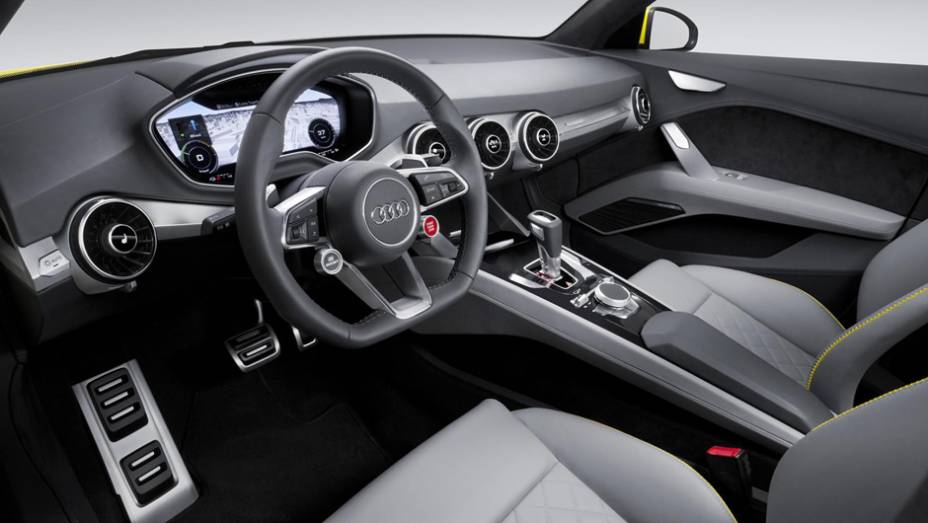 No painel foi inclu&iacute;do uma tela de 12,3 polegadas que produz gr&aacute;ficos em 3D. | <a href="https://gutenberg.quatrorodas.abril.com.br/noticias/saloes/pequim-2014/audi-tt-offroad-revelado-780298.shtml" rel="migration">Leia mais</a>