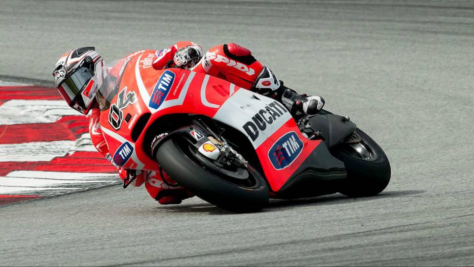 Andrea Dovizioso (Ducati Team) ficou em oitavo no último dia de testes em Sepang. <a href="https://gutenberg.quatrorodas.abril.com.br/moto/noticias/motogp-pedrosa-lidera-ultimo-dia-sepang-734820.shtml" rel="migration">Leia mais</a>