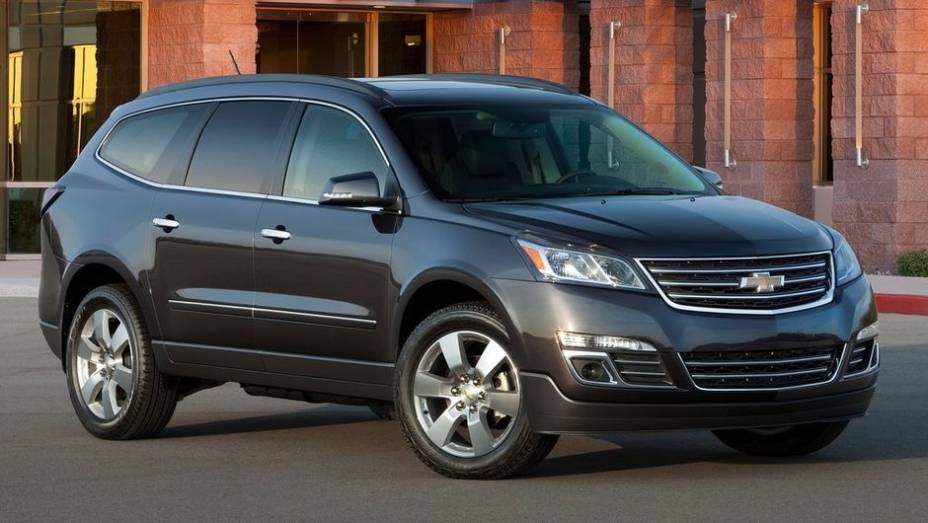 SUVs médios de 3 fileiras - 2013 Chevrolet Traverse - Preço inicial nos EUA: US$ 30.510 - Preço inicial no Brasil: não é vendido | <a href="%20https://gutenberg.quatrorodas.abril.com.br/noticias/mercado/gm-domina-premio-best-cars-for-families-2013-738171.shtml" rel="migration">Leia m</a>