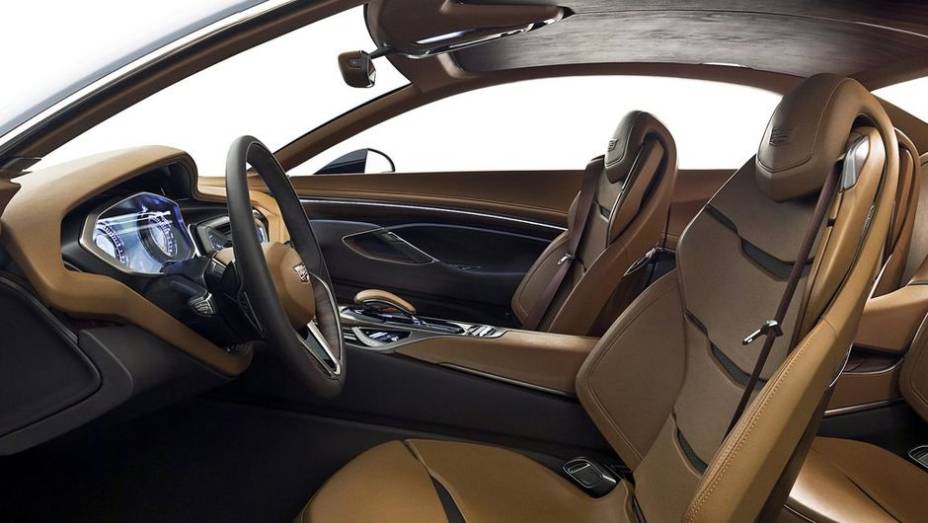 Por dentro, é possível visualizar o esquema de bancos 2 + 2 | <a href="https://gutenberg.quatrorodas.abril.com.br/noticias/fabricantes/cadillac-elmiraj-concept-revelado-750167.shtml" rel="migration">Leia mais</a>