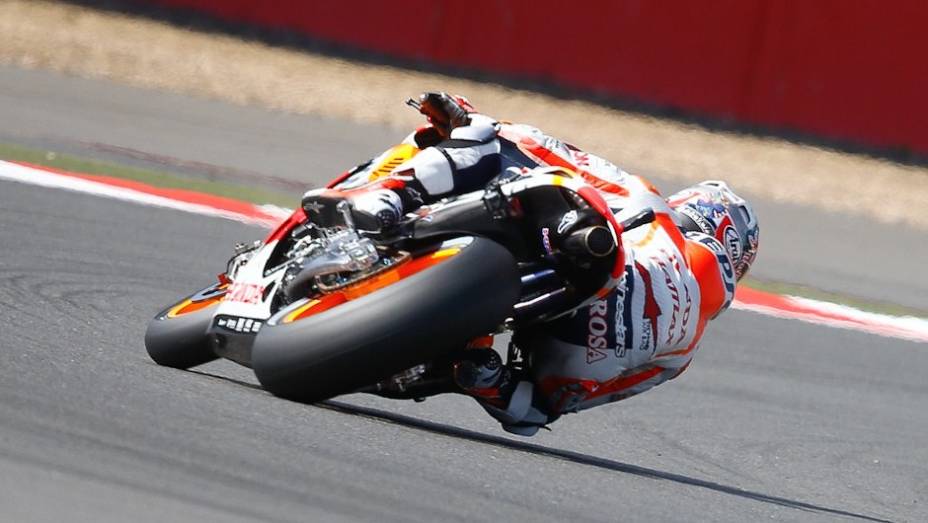 ...e Dani Pedrosa terminou em terceiro | <a href="https://gutenberg.quatrorodas.abril.com.br/moto/noticias/motogp-lorenzo-lidera-sexta-feira-751904.shtml" rel="migration">Leia mais</a>