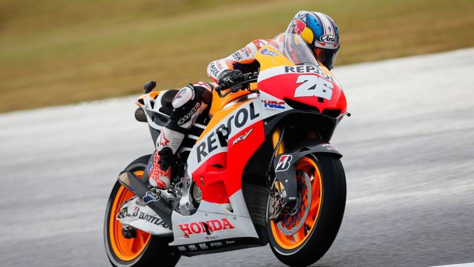 Em seguida, vieram Dani Pedrosa... | <a href="https://gutenberg.quatrorodas.abril.com.br/moto/noticias/motogp-lorenzo-voa-pole-japao-758277.shtml" rel="migration">Leia mais</a>