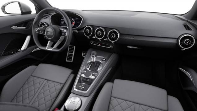 Internamente, o novo TT é equipado com volante de base achatada, display de informações de 12,3 polegadas... | <a href="https://gutenberg.quatrorodas.abril.com.br/noticias/saloes/genebra-2014/audi-apresenta-novo-tt-775222.shtml" rel="migration">Leia mais</a> Internamente, o novo TT é equipado com volante de base achatada, display de informações de 12,3 polegadas... | <a href="https://gutenberg.quatrorodas.abril.com.br/noticias/saloes/genebra-2014/audi-apresenta-novo-tt-775222.shtml" rel="migration">Leia mais</a>