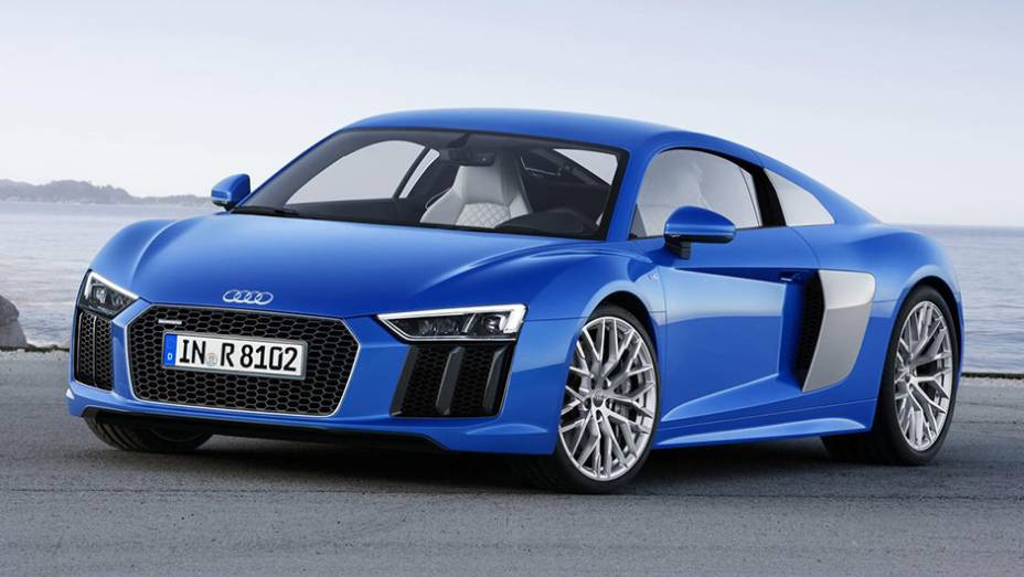 O Audi R8 passou por uma dieta rígida e perdeu 200 kg em sua nova geração | <a href="https://gutenberg.quatrorodas.abril.com.br/noticias/saloes/genebra-2015/audi-revela-oficialmente-nova-geracao-esportivo-r8-841481.shtml" rel="migration">Leia mais</a>