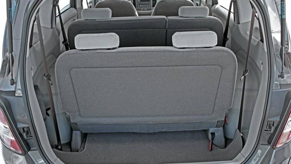 O Flex7 da Zafira era mais inteligente... | <a href="https://gutenberg.quatrorodas.abril.com.br/carros/comparativos/chevrolet-spin-x-nissan-grand-livina-700392.shtml" rel="migration">Leia o comparativo</a> - <a href="https://gutenberg.quatrorodas.abril.com.br/galerias/nissan/grand-livina-ed-08-" rel="migration"></a>