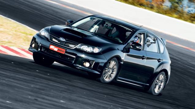 Tração integral ajudou o Impreza a contornar as curvas de alta | <a href="https://gutenberg.quatrorodas.abril.com.br/reportagens/geral/camaro-x-ds3-x-punto-x-jetta-x-impreza-703736.shtml" rel="migration">Leia mais</a> Tração integral ajudou o Impreza a contornar as curvas de alta | <a href="https://gutenberg.quatrorodas.abril.com.br/reportagens/geral/camaro-x-ds3-x-punto-x-jetta-x-impreza-703736.shtml" rel="migration">Leia mais</a>