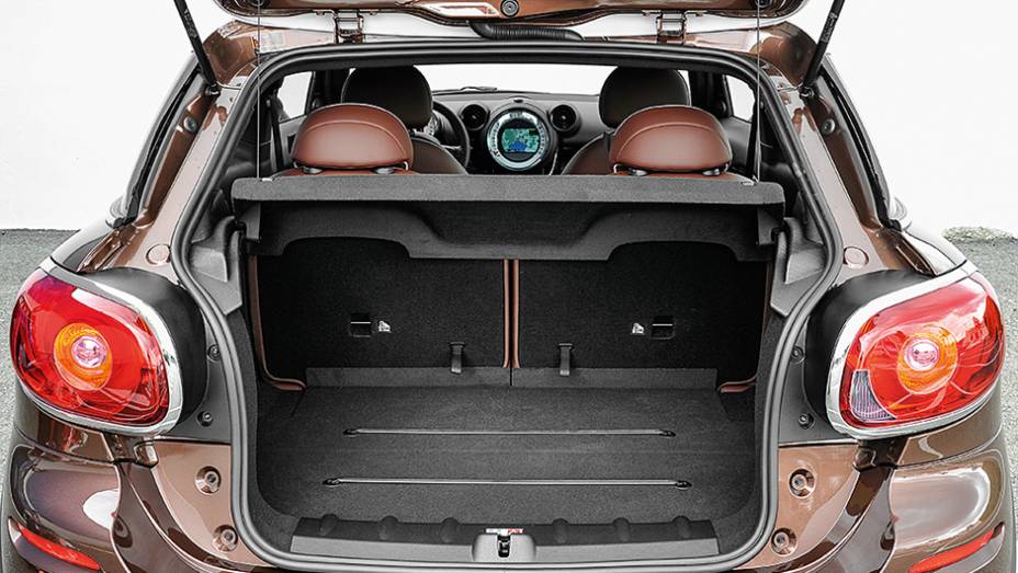 Porta-malas de 330 litros é ampliado... | <a href="https://gutenberg.quatrorodas.abril.com.br/carros/impressoes/mini-paceman-cooper-s-733312.shtml" rel="migration">Leia mais</a> Porta-malas de 330 litros é ampliado... | <a href="https://gutenberg.quatrorodas.abril.com.br/carros/impressoes/mini-paceman-cooper-s-733312.shtml" rel="migration">Leia mais</a>