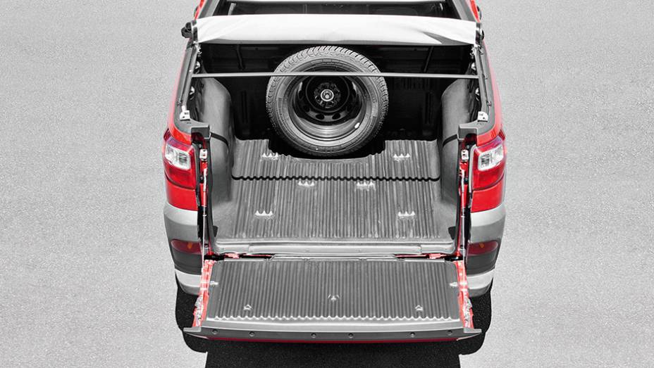 Caçamba curta: 680 litros ou 650 kg | <a href="https://gutenberg.quatrorodas.abril.com.br/carros/impressoes/fiat-strada-working-1-4-764158.shtml" rel="migration">Leia mais</a> Caçamba curta: 680 litros ou 650 kg | <a href="https://gutenberg.quatrorodas.abril.com.br/carros/impressoes/fiat-strada-working-1-4-764158.shtml" rel="migration">Leia mais</a>