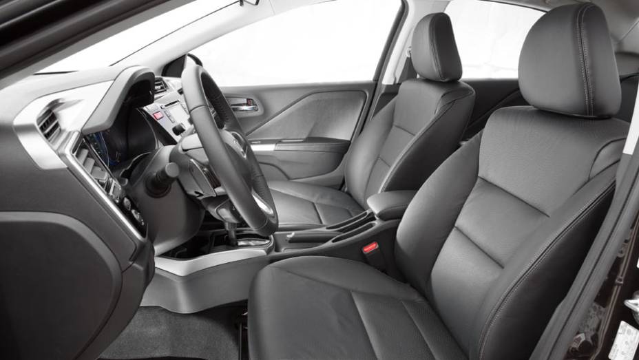 Sedã conta com borboletas que "mudam a marcha" atrás do volante | <a href="https://gutenberg.quatrorodas.abril.com.br/carros/testes/honda-city-807297.shtml" target="_blank" rel="migration">Leia mais</a> Sedã conta com borboletas que "mudam a marcha" atrás do volante | <a href="https://gutenberg.quatrorodas.abril.com.br/carros/testes/honda-city-807297.shtml" target="_blank" rel="migration">Leia mais</a>