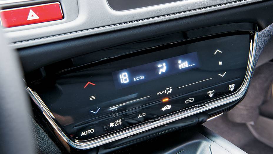 Ar-condicionado digital | <a href="https://gutenberg.quatrorodas.abril.com.br/carros/testes/honda-hr-v-exl-848201.shtml" target="_blank" rel="migration">Leia mais</a>