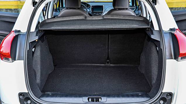 Piso elevado facilita a acomodação de carga |<a href="https://gutenberg.quatrorodas.abril.com.br/carros/testes/peugeot-2008-857260.shtml" target="_blank" rel="migration">Leia mais</a> Piso elevado facilita a acomodação de carga |<a href="https://gutenberg.quatrorodas.abril.com.br/carros/testes/peugeot-2008-857260.shtml" target="_blank" rel="migration">Leia mais</a>