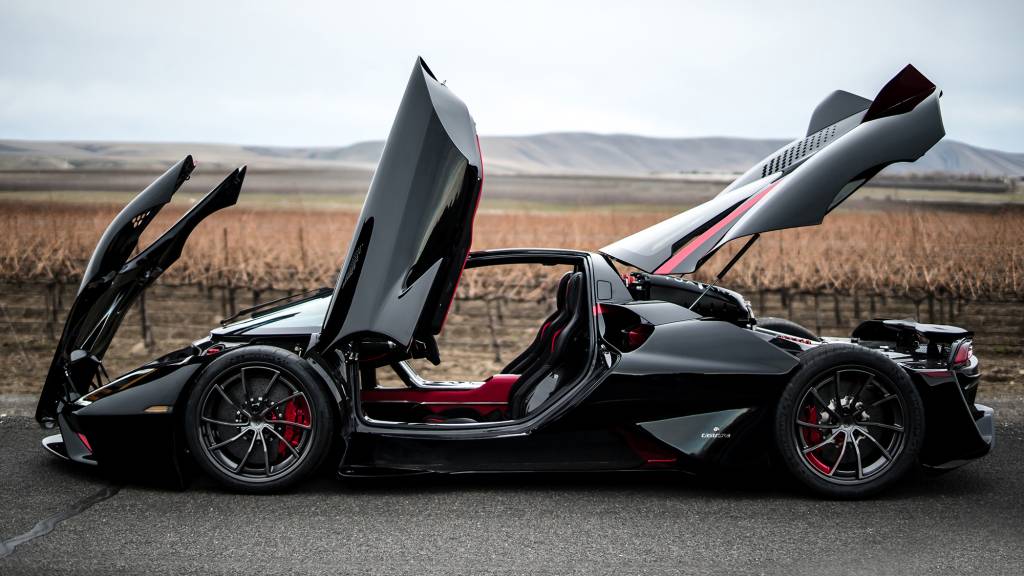 SSC TUATARA SSC Tuatara preto visto de lado com portas abertas