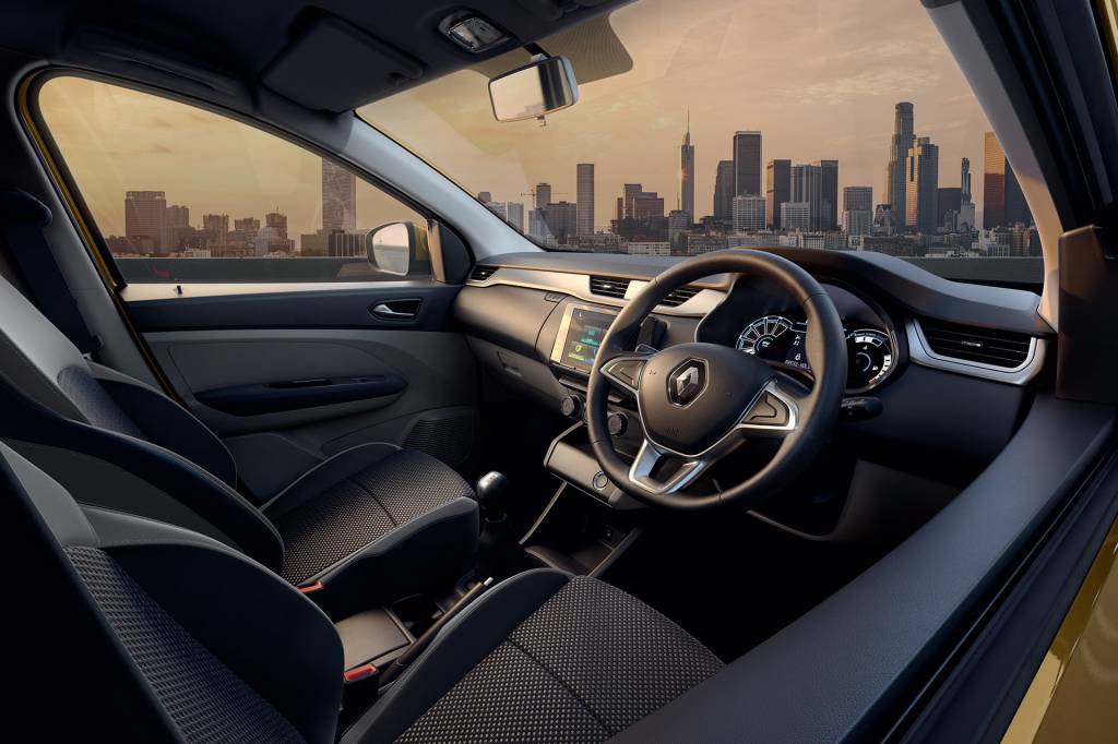 RENAULT TRIBER (RBC) Exceto pelos assentos extras (e volante à direita), interior é idêntico ao do Kwid